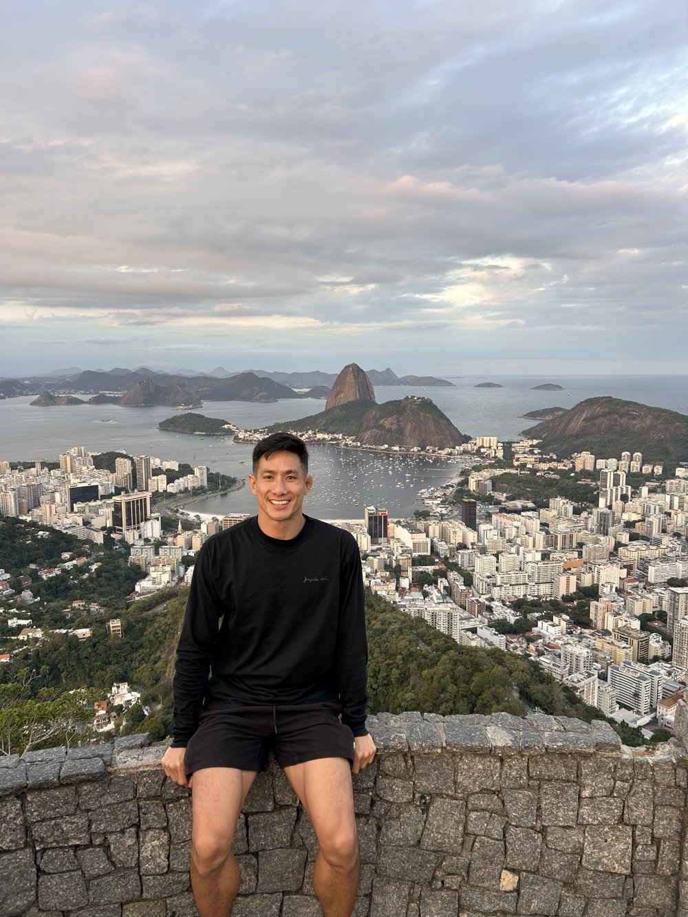 Juan, founder of Flow, overlooking Guanabara Bay and Sugarloaf Mountain in Rio de Janeiro